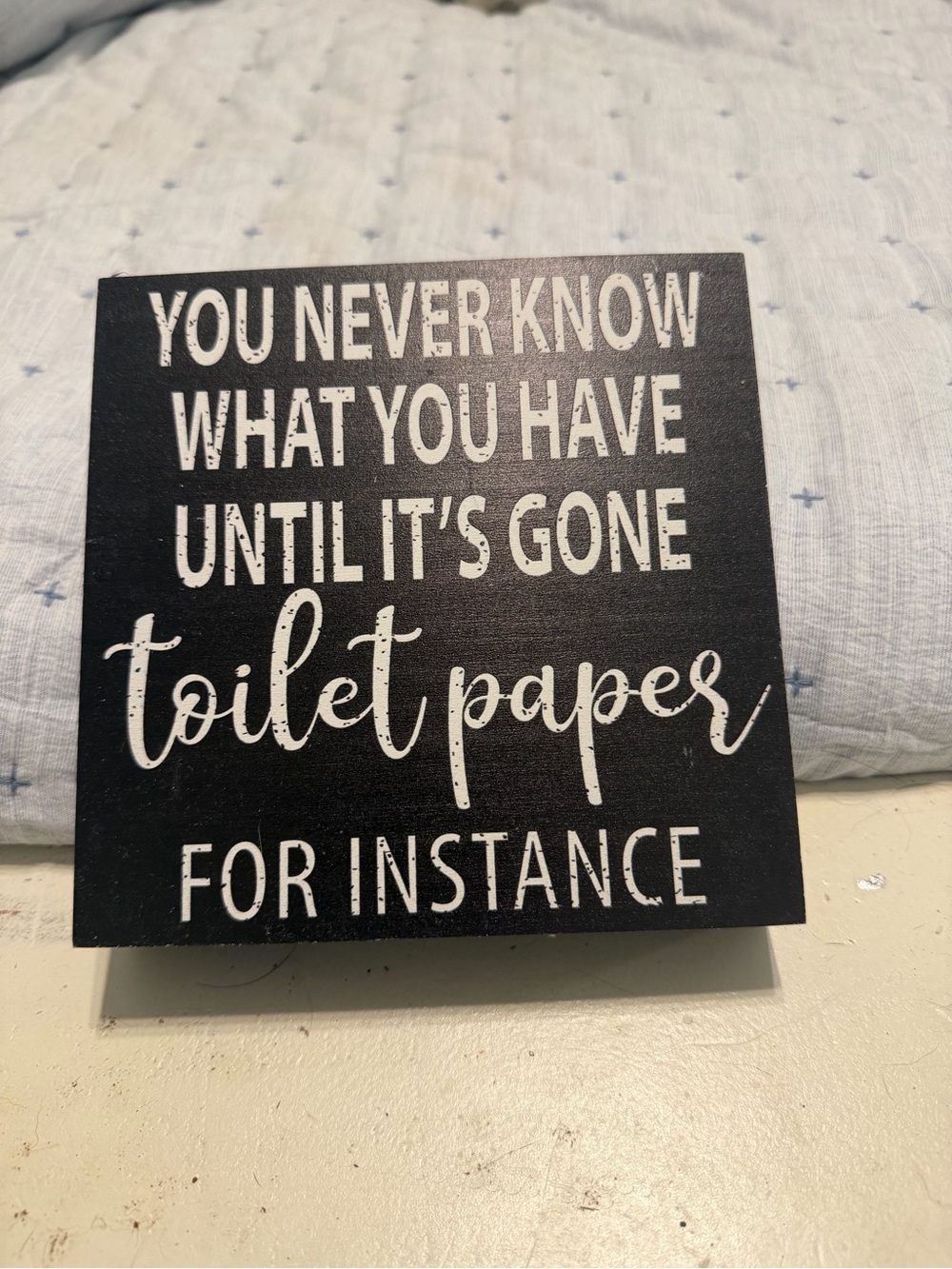 Black Humorous Bathroom Wall Sign - 'You Never Know What You Have'